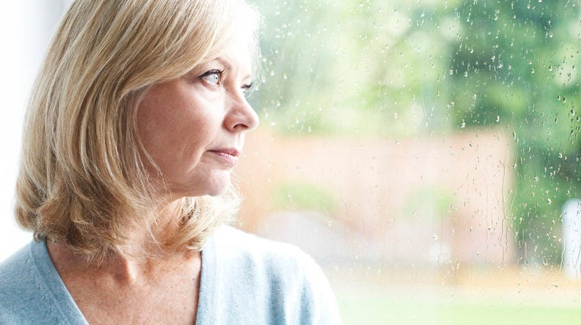 Sad Mature Woman Suffering From Agoraphobia Looking Out Of Windo Sad Mature Woman Suffering From Agoraphobia Looking Out Of Window